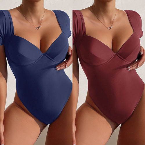 Damen Einteiler Badeanzug mit eleganten Trägern und sculpturalem V-Ausschnitt Echo Archiv