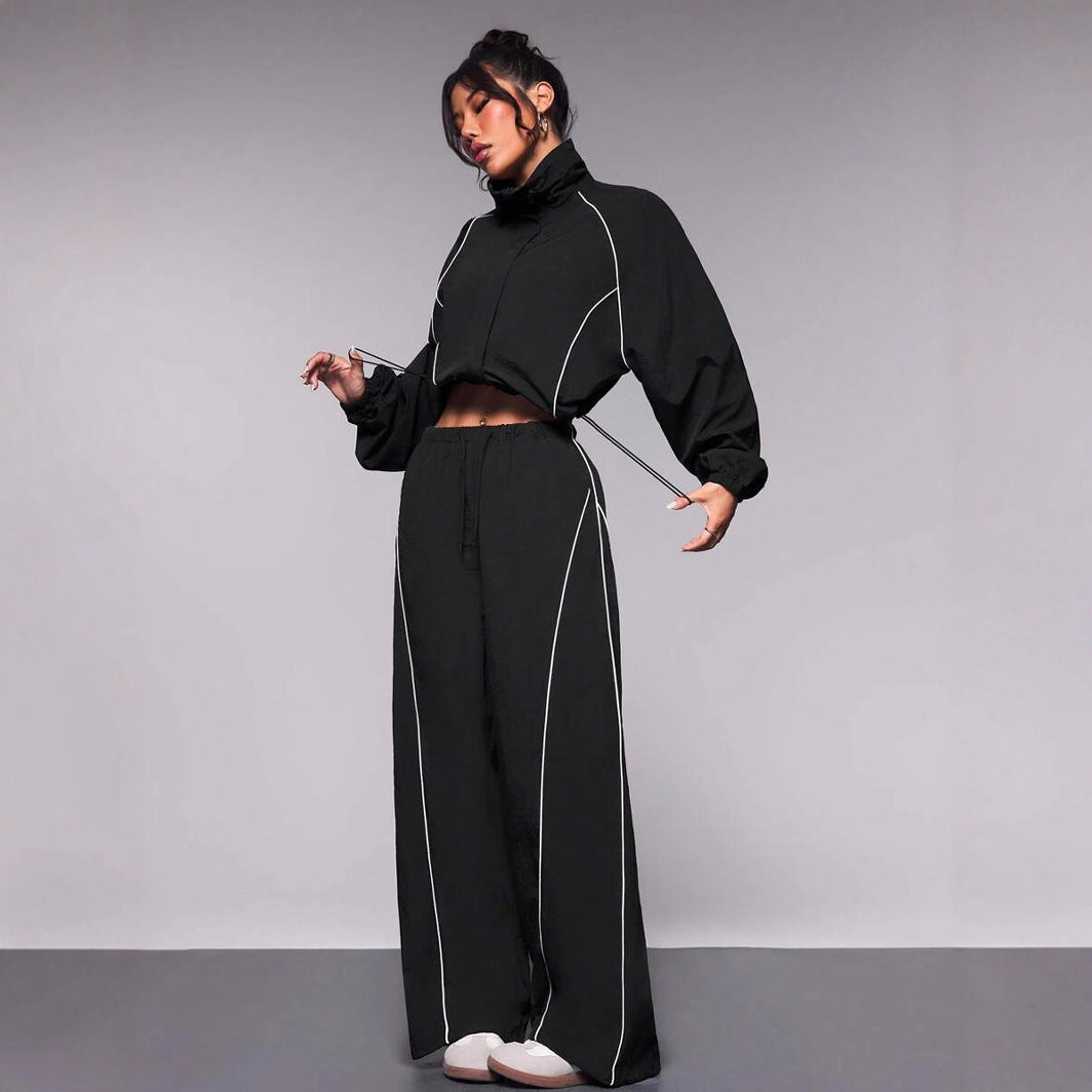 Damen sportives Cropped Windbreaker-Set mit Stehkragen Tunnelzug und reflektierenden Paspeln – Avérine