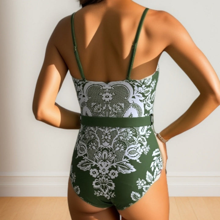 Damen modischer Einteiler Badeanzug mit elegantem Wickelrock und floralem Muster Echo Archiv