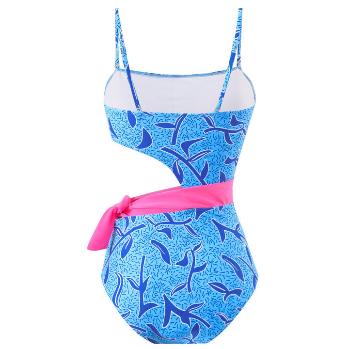 Damen Einteiler Badeanzug mit asymmetrischem Schnitt und farbenfrohem Wickelrock Echo Archiv