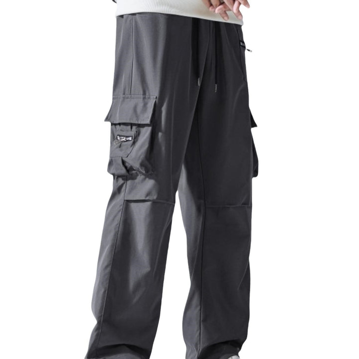 Herren Weite Cargo‑Hose im Baggy‑Cut mit Tunnelzugbund, Zipper‑Tasche & Klappfächern Echo Archiv