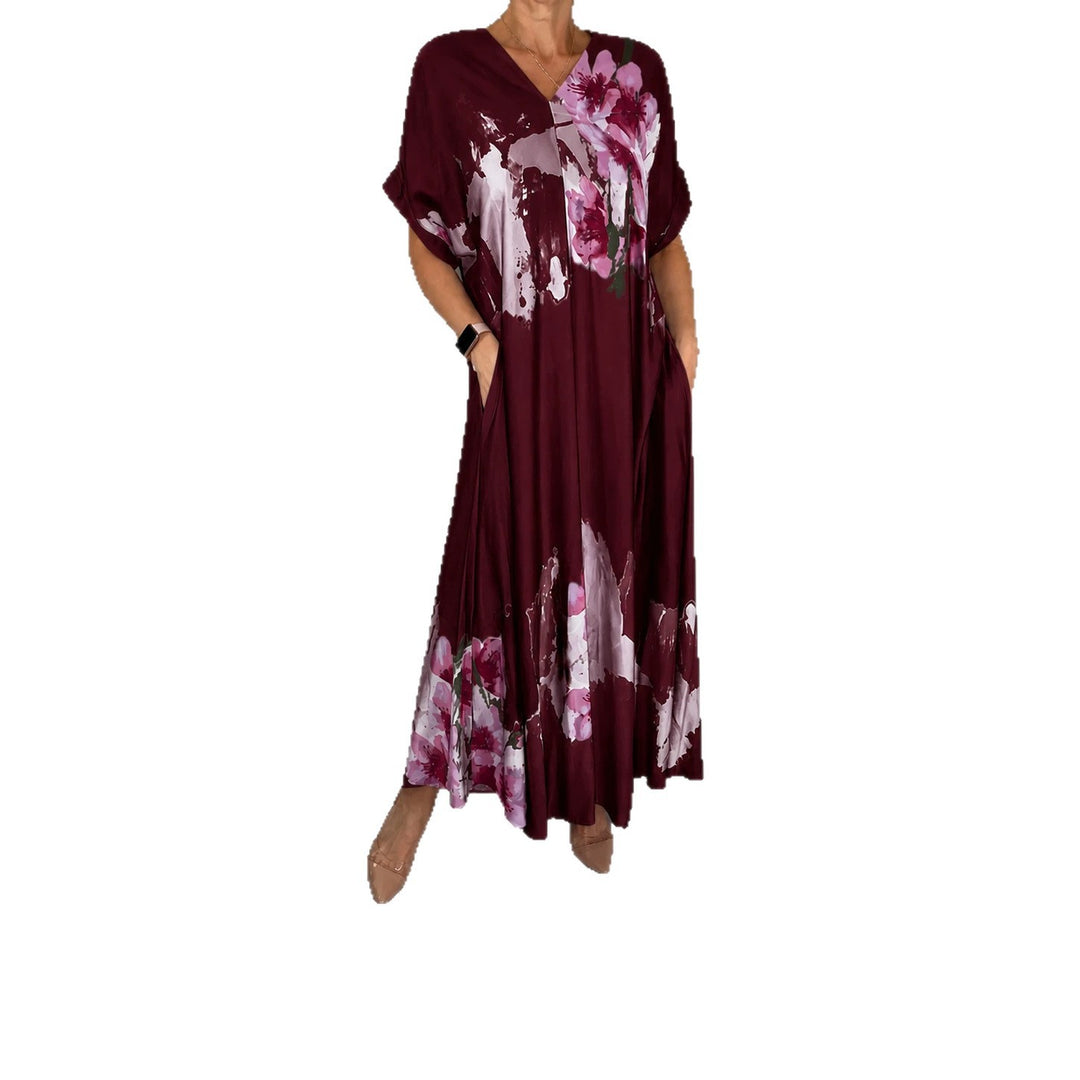 Damen Maxikleid mit weitem Fall, V-Ausschnitt, Eingrifftaschen und floraler Aquarelloptik Echoarchiv