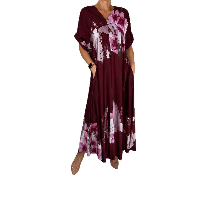 Damen Maxikleid mit weitem Fall, V-Ausschnitt, Eingrifftaschen und floraler Aquarelloptik Echoarchiv