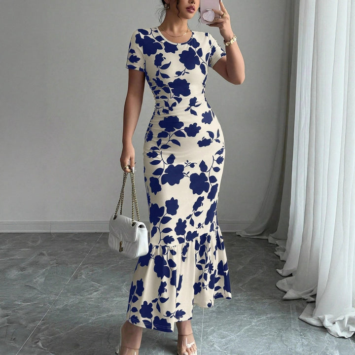 Damen Elegantes figurbetontes Kleid mit Rüschen-Saum und floralem Muster Echo Archiv