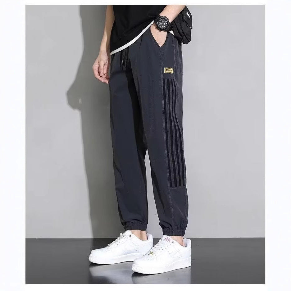 Damen Sportliche Trainingshose mit seitlichen Streifen Echoarchiv