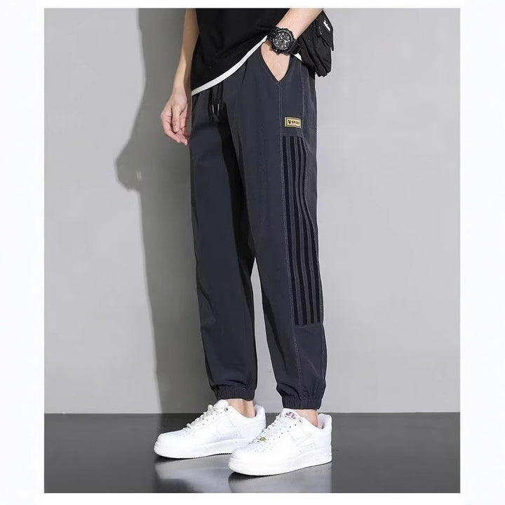 Damen Sportliche Trainingshose mit seitlichen Streifen Echoarchiv