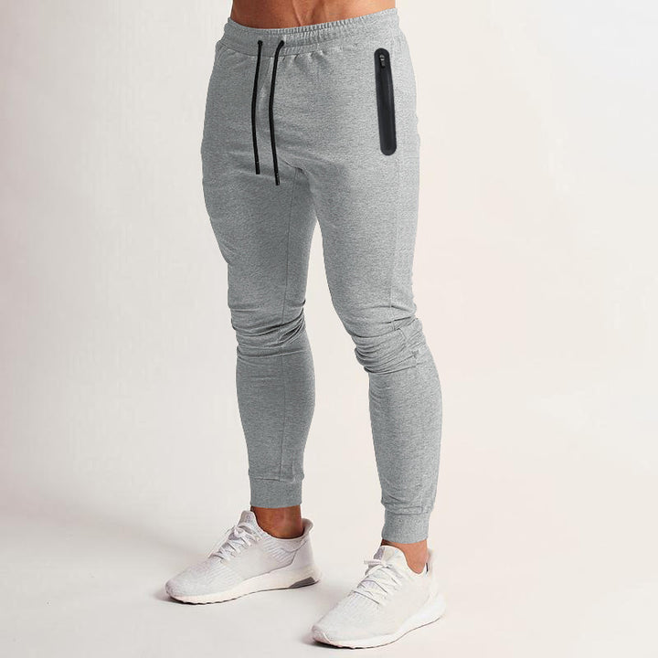 Herren schmal geschnittene Jogginghose mit Reißverschlusstaschen und Kordelzug Echoarchiv