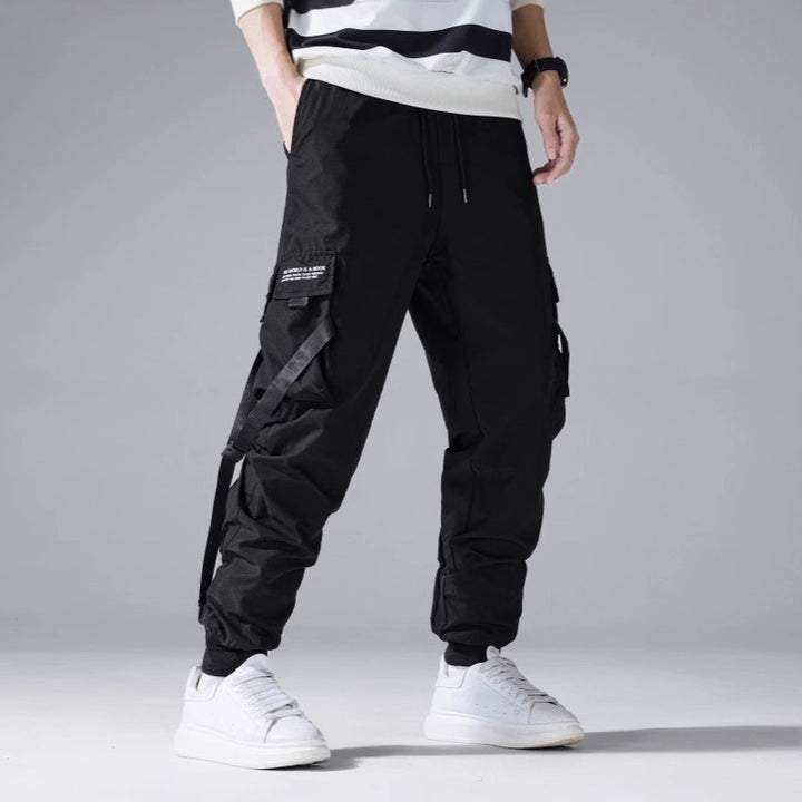 Herren Tech‑Cargo‑Jogger mit taktischen Klappentaschen, verstellbaren Nylonriemen und elastischem Knöchelsaum Echo Archiv