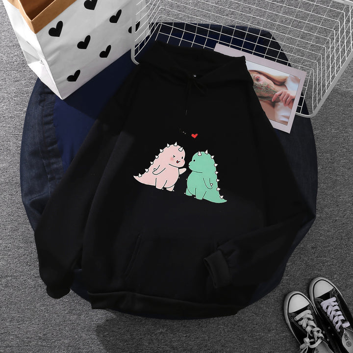 Damen Kapuzenpullover mit niedlicher Dinosaurierpärchen‑Illustration, Oversize‑Schnitt und Kängurutasche – Auréline