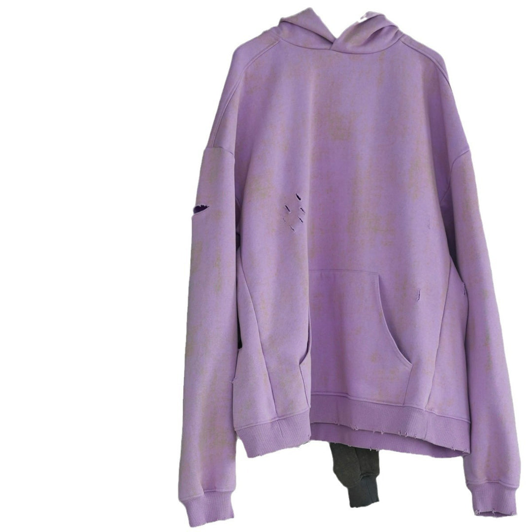 Damen Oversized-Hoodie mit Used-Optik und Riss-Details Echoarchiv