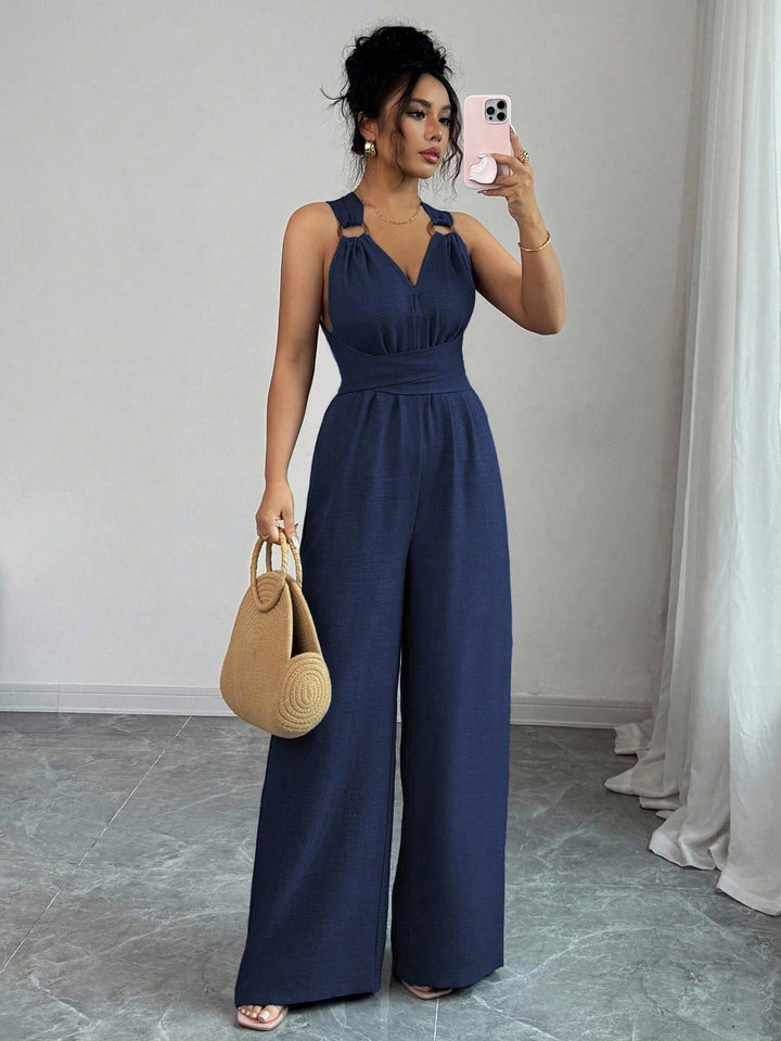 Damen Jumpsuit mit weitem Bein, tailliertem Wickelband und Ösen-Trägern Echo Archiv