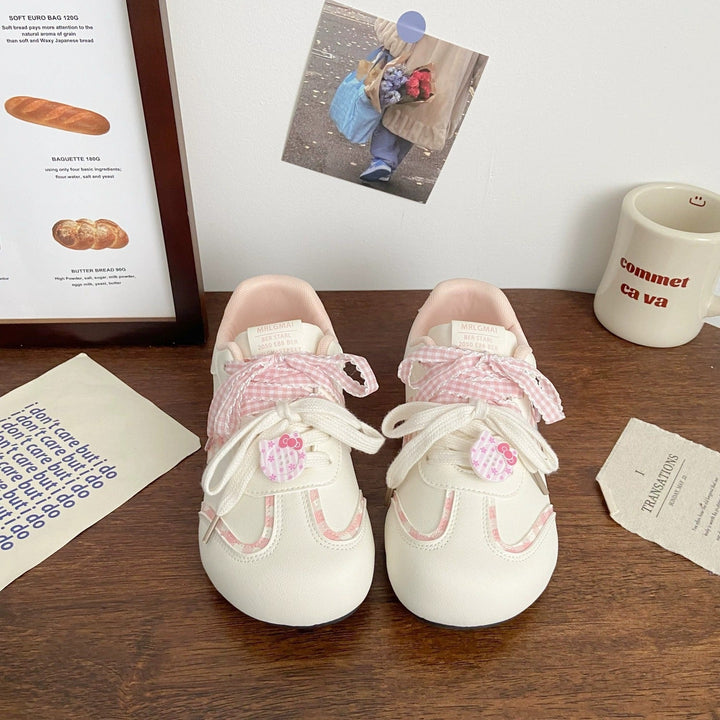 Damen Verspielte Sneakers mit dekorativen Schleifen und tierischen Applikationen Echo Archiv