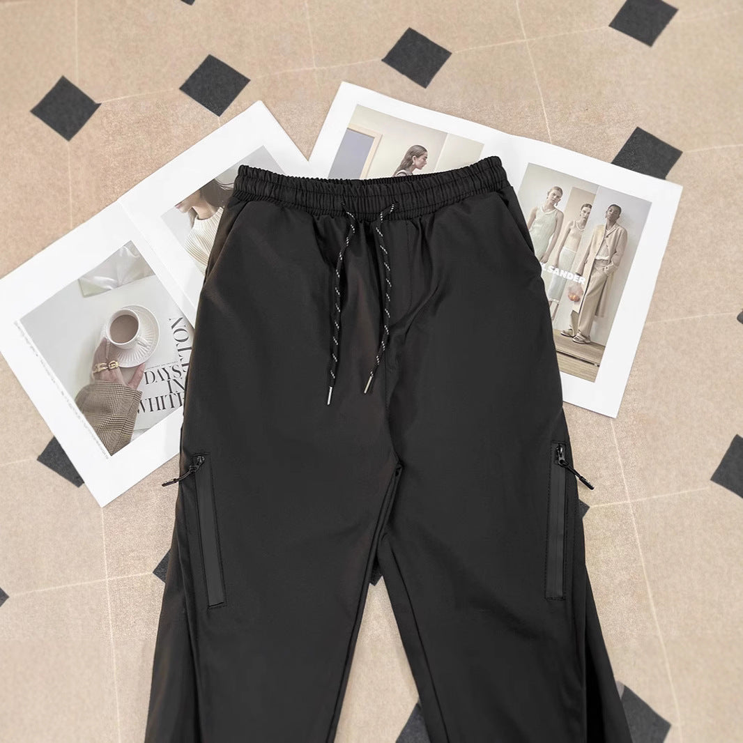 Unisex Sportliche Jogginghose mit verstellbarem Bund und Seitentaschen Echoarchiv