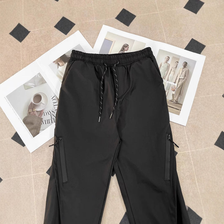 Unisex Sportliche Jogginghose mit verstellbarem Bund und Seitentaschen Echoarchiv
