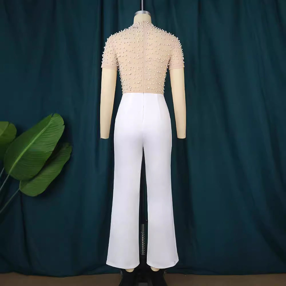 Damen eleganter Jumpsuit mit glitzernden Perlenakzenten Echo Archiv