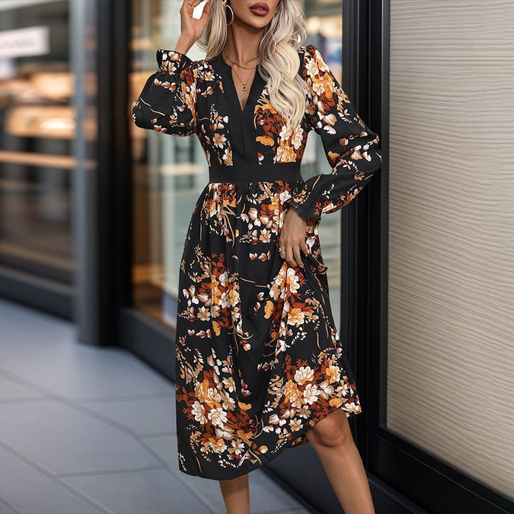 Damen Midikleid mit tailliertem Bund, V‑Ausschnitt, langen Ärmeln und floralem Allover‑Print Echoarchiv