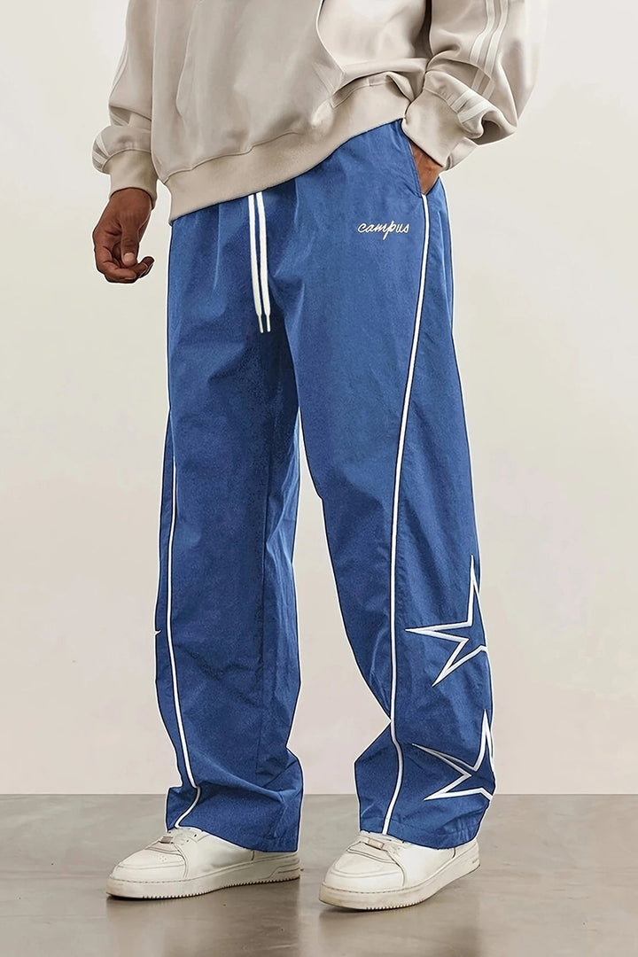 Herren Weite Trackpants mit Kontrastpaspel, Kordelzug und Sternapplikation Echo Archiv
