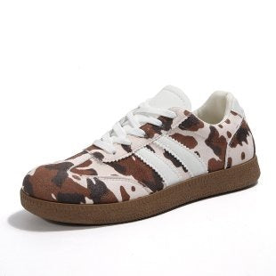 Damen Retro-Lowtop-Sneaker mit Kuhflecken-Print und gepolsterter Komfortsohle – Névara