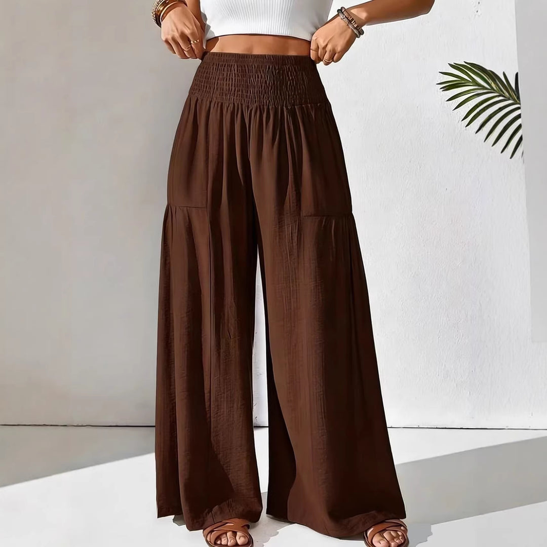 Damen weite Palazzo-Hose mit gerafftem Smock-Bund und Stufendetails – Avélisse