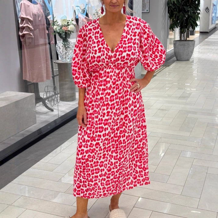 Damen nan Maxikleid mit tiefem V-Ausschnitt, voluminösen Puffärmeln und smockierter Taillennaht Echo Archiv