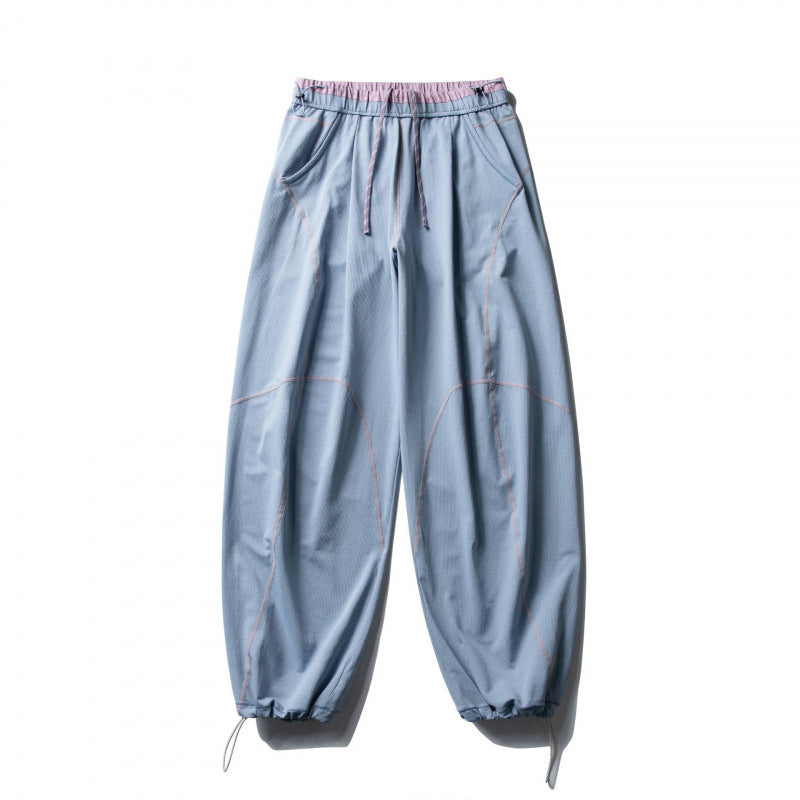 Unisex Locker geschnittene Tech-Jogginghose mit elastischem Bund, markanten Flatlock-Nähten und Kordelzug Echo Archiv