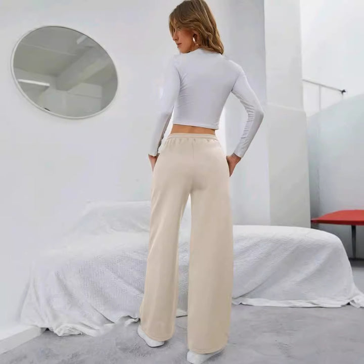 Damen nan High‑Waist Wide‑Leg Jogginghose mit elastischem Komfortbund, Kordelzug und tiefen Eingrifftaschen Echo Archiv