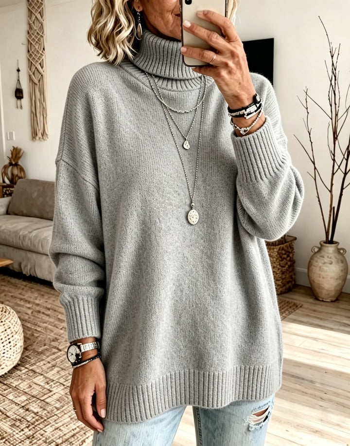 Damen Oversize Rollkragenpullover aus Feinstrick mit gerippten Bündchen und überschnittener Schulter – Mavelle