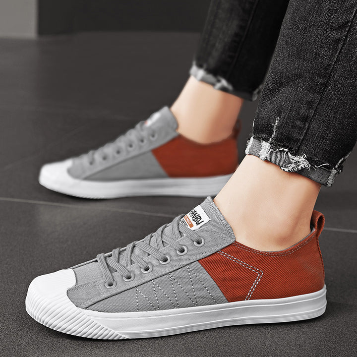 Unisex niedrige Canvas-Sneaker mit verstärkter Gummi-Zehenkappe und kontrastierenden Textilpaneelen – Norré