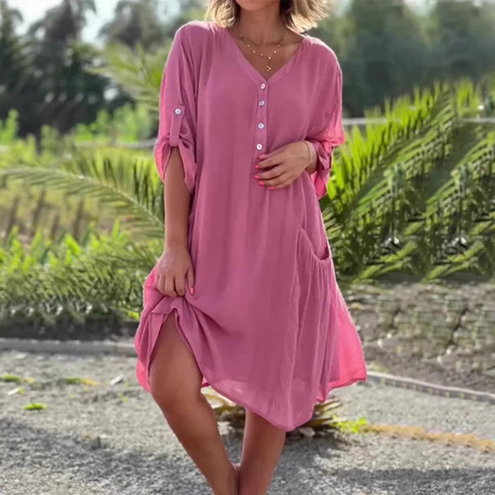 Damen nan luftiges V-Ausschnitt Strandkleid mit Knopfleiste, Krempelärmeln und aufgesetzten Seitentaschen Echo Archiv