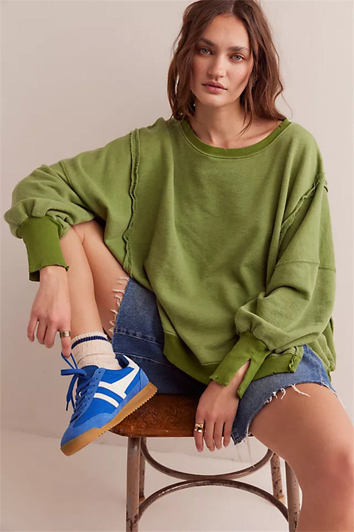 Damen oversized Sweatshirt mit Ballonärmeln, offenen Saumnähten und seitlichen Schlitzen – Avérine