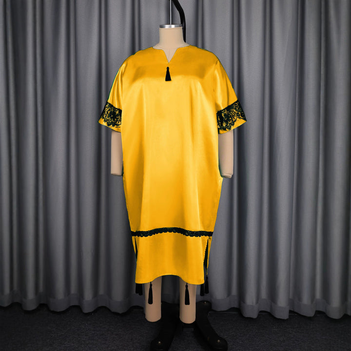 Damen elegantes Kaftankleid mit raffinierten Spitzenärmel und dekorativen Quasten Echo Archiv
