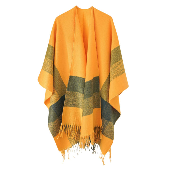 Damen Kuscheliger Oversize Poncho mit Fransen und Blockstreifen – Avérine