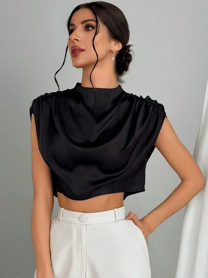 Damen Elegantes Crop-Top mit voluminösen Ärmeln und edlem Rückenausschnitt Echo Archiv