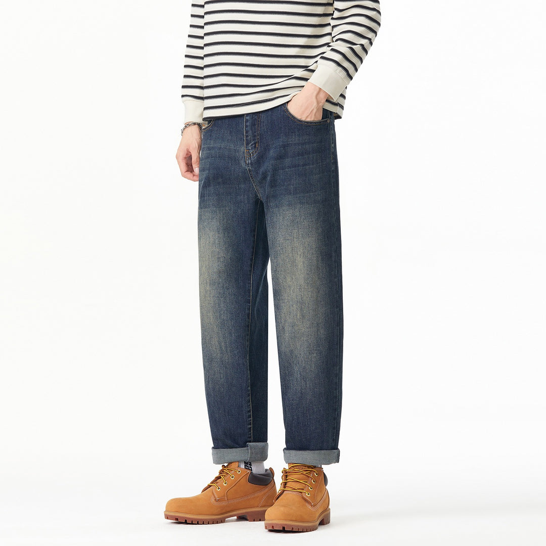 Herren Weite gerade geschnittene Denim-Jeans mit Used‑Wash und Umschlagbund Echoarchiv
