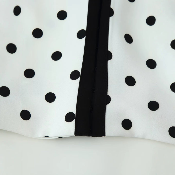 Damen Kurzblazer im Polka-Dot-Design mit Rundhalsausschnitt, kurzem Schnitt und Kontrastpaspeln Echo Archiv