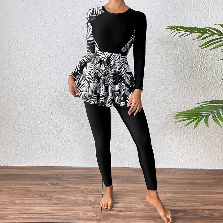 Damen Sportlicher Langarm Badeanzug mit Rüschendetails Echo Archiv