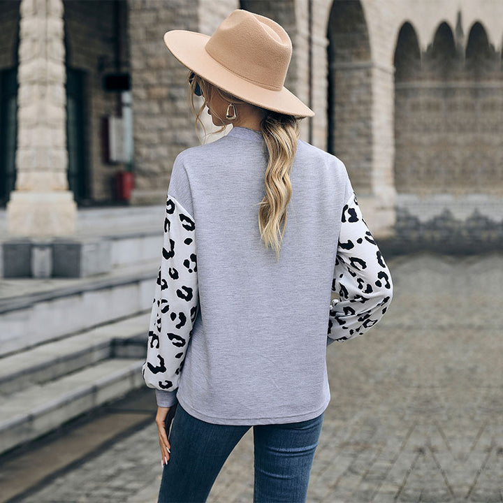 Damen Lässiger Pullover mit Leopardenärmel Echo Archiv