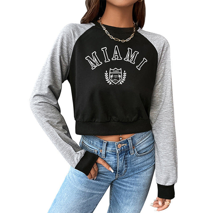 Damen Kurzgeschnittenes College-Cropped-Sweatshirt mit Raglanärmeln und elastischem Saum Echoarchiv