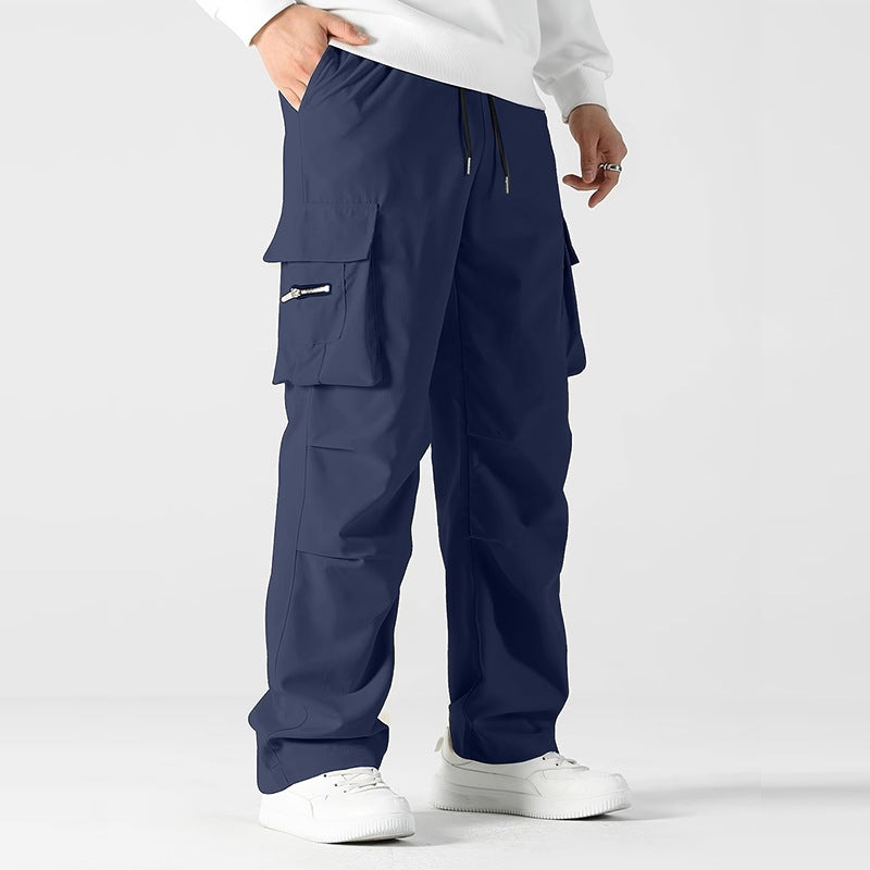 Herren weite Utility-Cargohose mit Tunnelzugbund, Knieabnähern und Multifachtaschen Echo Archiv