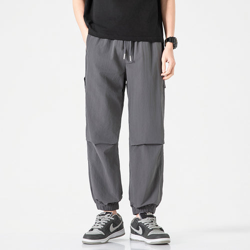 Herren Nylon-Mix Relaxed-Jogger mit elastischem Komfortbund, verdeckten Reißverschlusstaschen und geripptem Knöchelabschluss Echo Archiv