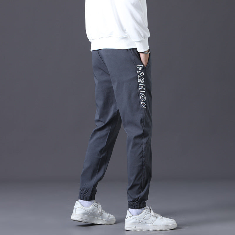 Herren modische Jogginghose mit elastischem Bund und seitlichen Taschen Echoarchiv