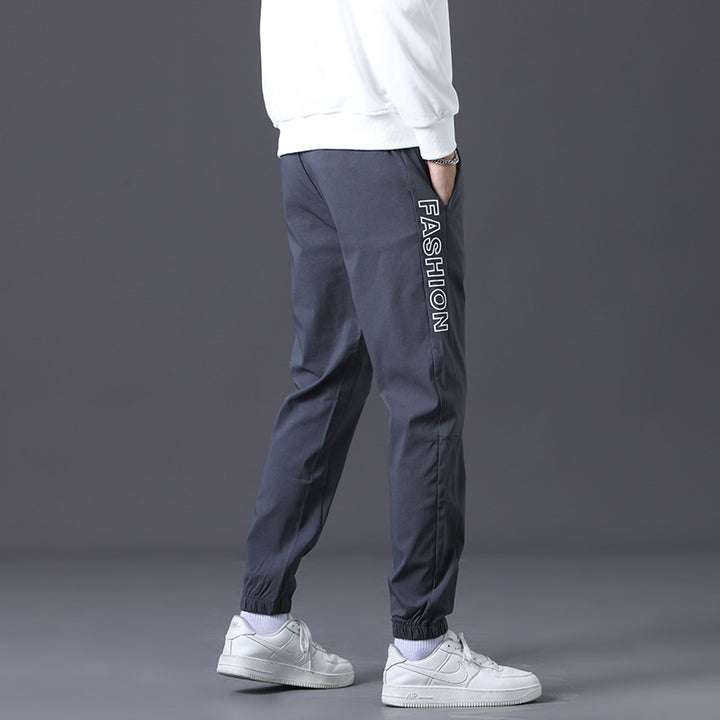Herren modische Jogginghose mit elastischem Bund und seitlichen Taschen Echoarchiv