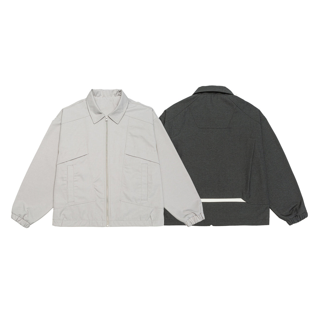 Unisex Kurzblouson im Boxy‑Cut mit Hemdkragen, sichtbarem Metallreißverschluss und Utility‑Pattentaschen Echoarchiv
