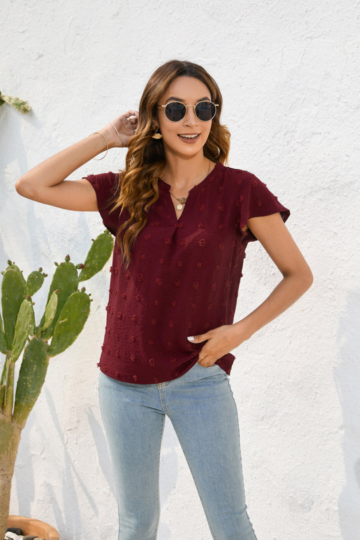 Damen Leichtes Kurzarmblusenshirt mit strukturiertem Material und eleganten Details Echo Archiv