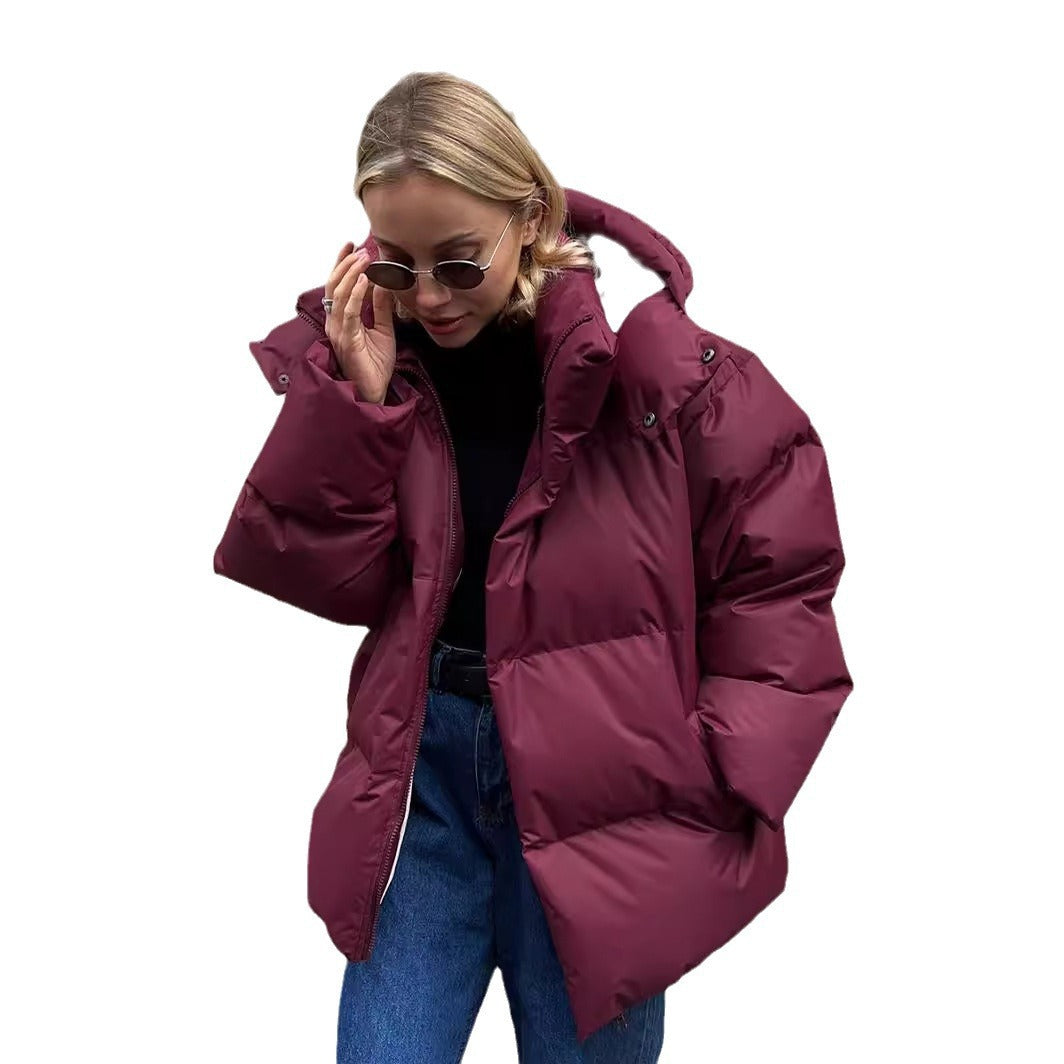 Damen Oversize Steppjacke mit Kapuze und wattierter Thermofüllung Echoarchiv