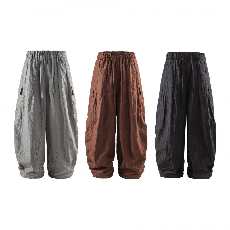 Unisex Weite Cropped Cargo-Hose mit elastischem Bund, Tunnelzug und aufgesetzten Taschen Echo Archiv