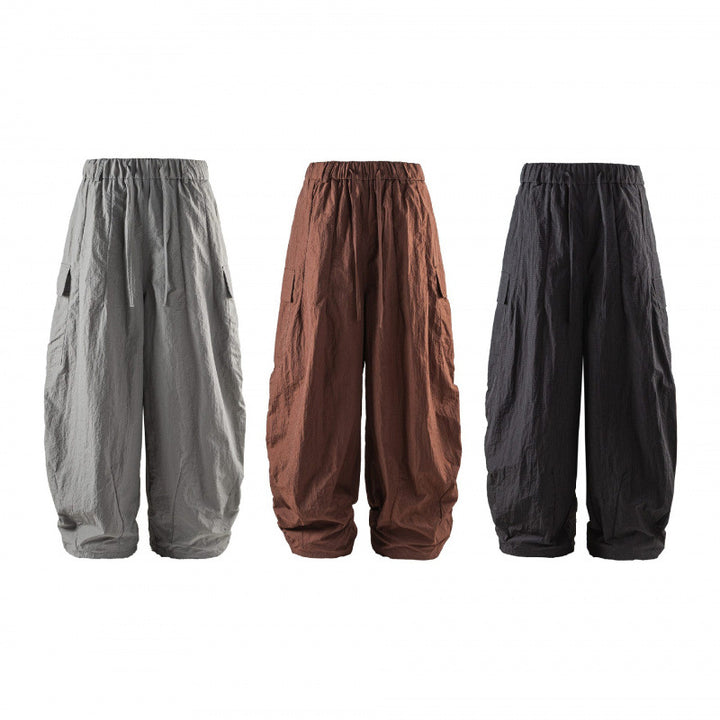 Unisex Weite Cropped Cargo-Hose mit elastischem Bund, Tunnelzug und aufgesetzten Taschen Echo Archiv