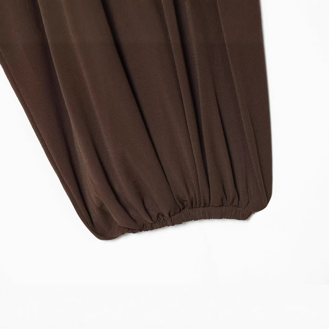 Damen Voluminöse Plissee-Bluse mit weiten Raglanärmeln und elastischem Bund Echoarchiv