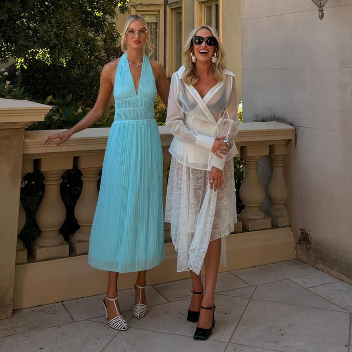 Damen Fließendes Maxikleid mit tiefem V-Ausschnitt und Plisseedetails Echo Archiv