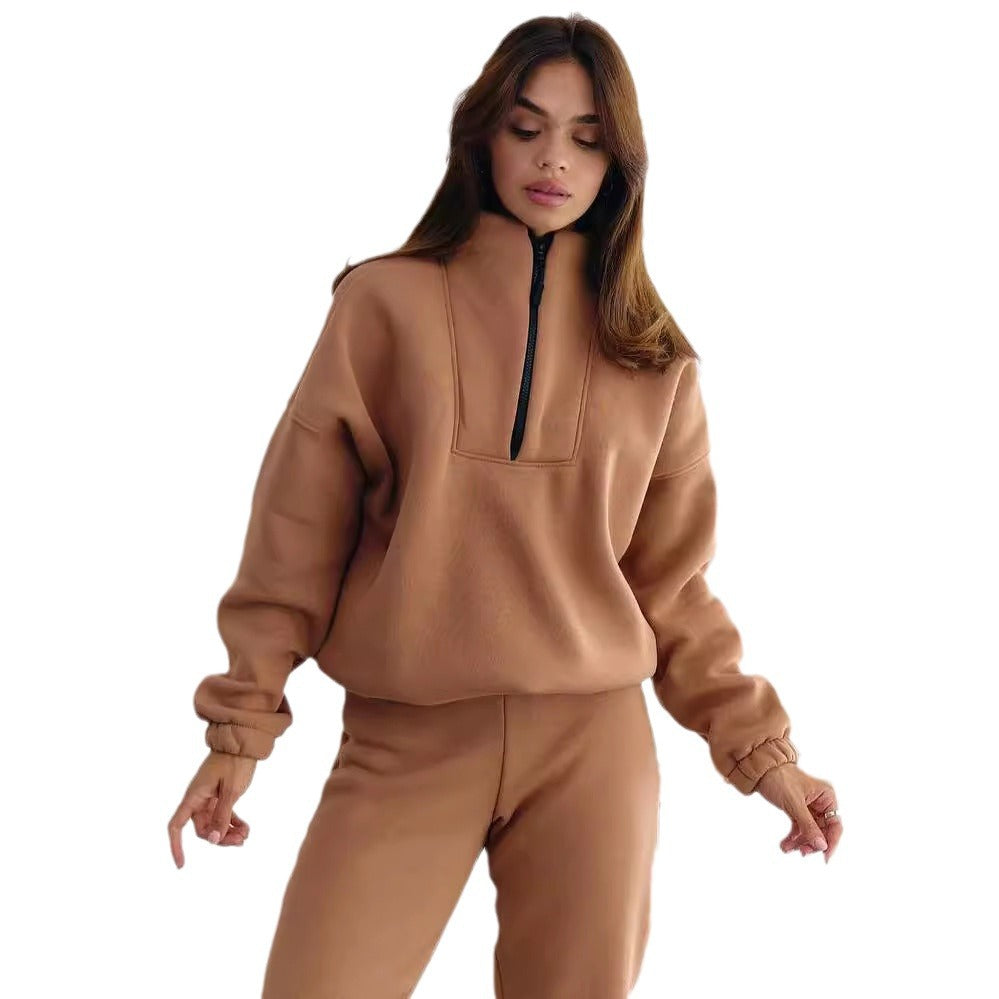 Damen Athleisure-Zweiteiler aus dickem French-Terry mit hohem Stehkragen, halbem Reißverschluss und Tunnelzughose Echoarchiv